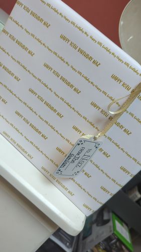 Customer photo review of Personalised Gold Name Wrapping Paper