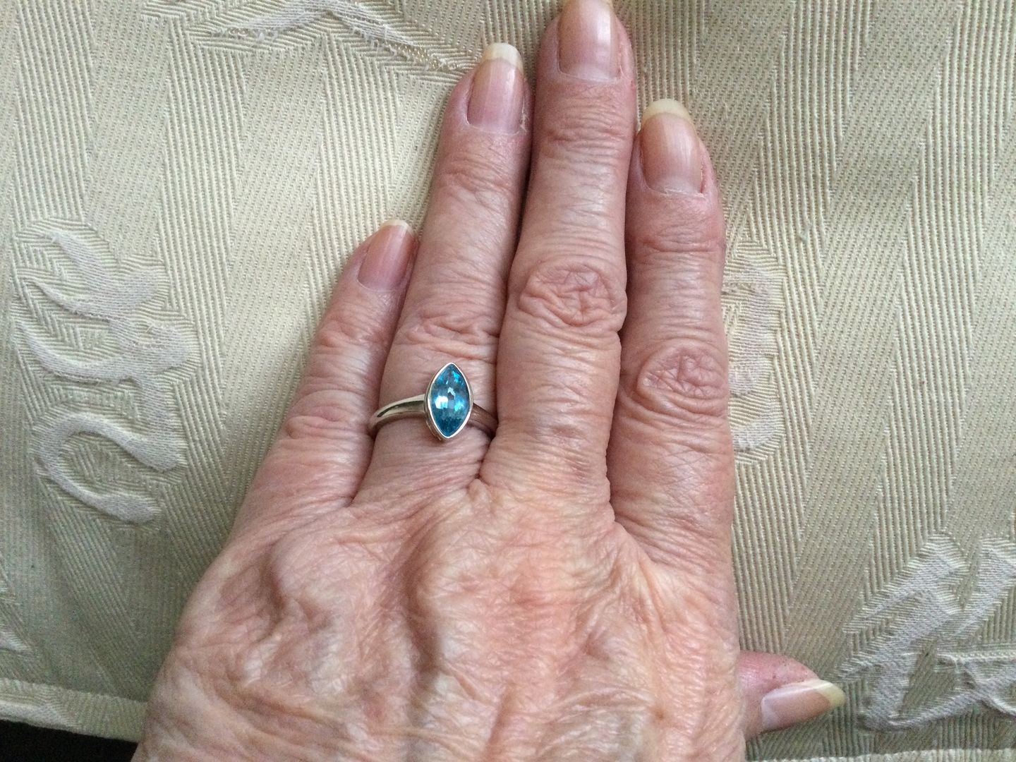 Customer photo review of Surf Moon Ring with Swiss Blue Topaz