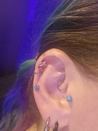 Customer photo review of Red Cherry Cartilage/Tragus Ring