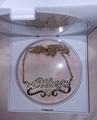 Customer photo review of Iced Out Butterfly Pendants