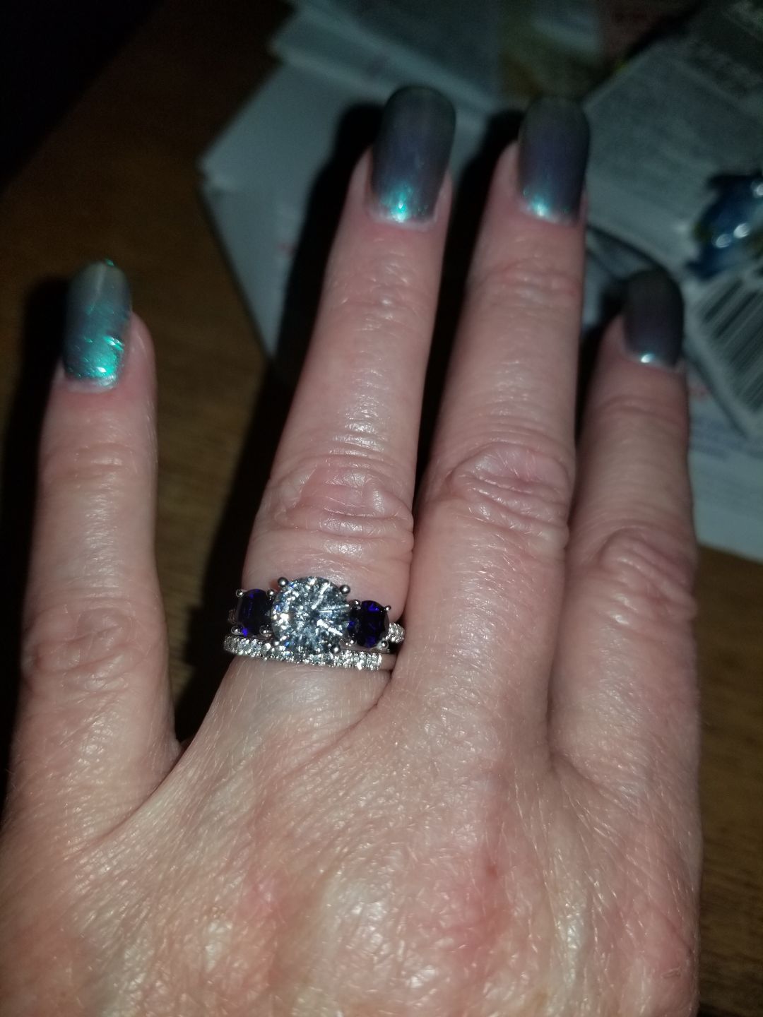 Customer photo review of Three Stone Moissanite and Blue Sapphire Pave Engagement Ring