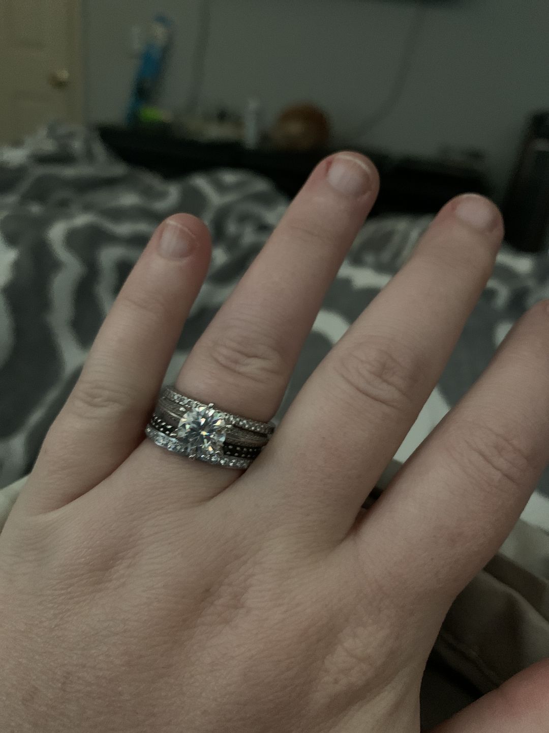 Customer photo review of Knife Edge Pave Moissanite Sterling Silver Engagement Ring