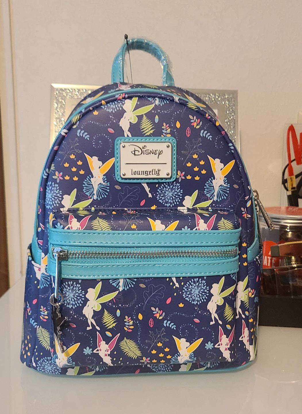 Customer photo review of 707 Street Exclusive - Disney Tinkerbell Glow in the Dark Allover Print Mini Backpack w/ Teal Straps