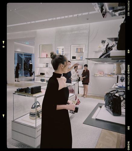 Customer photo review of SABRINA Pleated Midi Dress