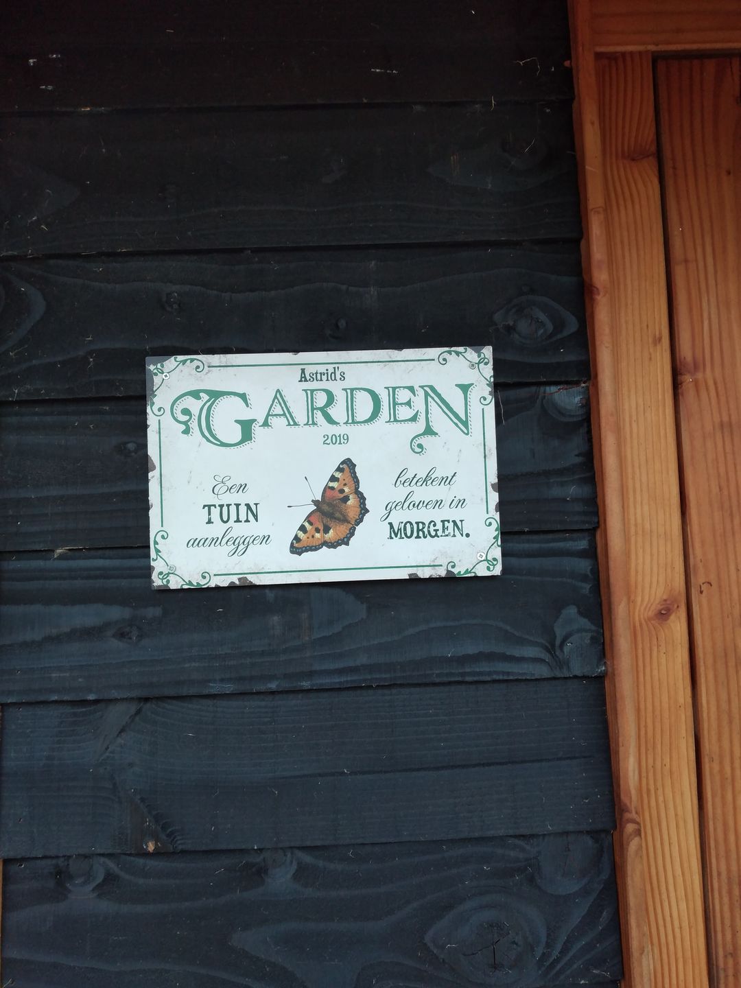 Customer photo review of Tuingeluk - Tuin-deurbord