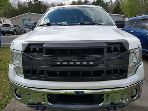 Customer photo review of Armor Grille w/Off-Road Lights, Replaceable Letters- Matte Black for 2009-2014 Ford F150