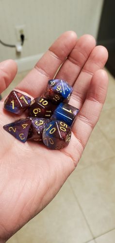 Customer photo review of 3 MYSTERY ACRYLIC DICE SETS