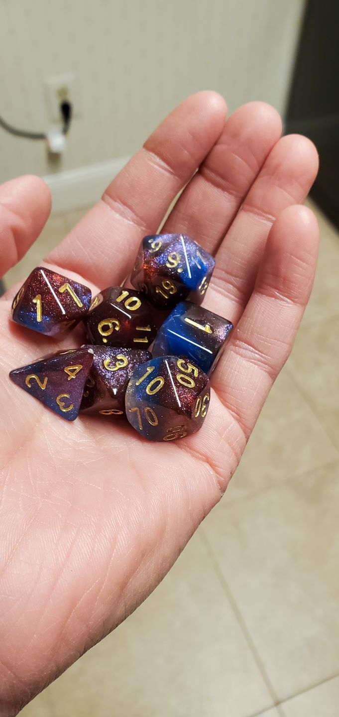 Customer photo review of 3 MYSTERY ACRYLIC DICE SETS
