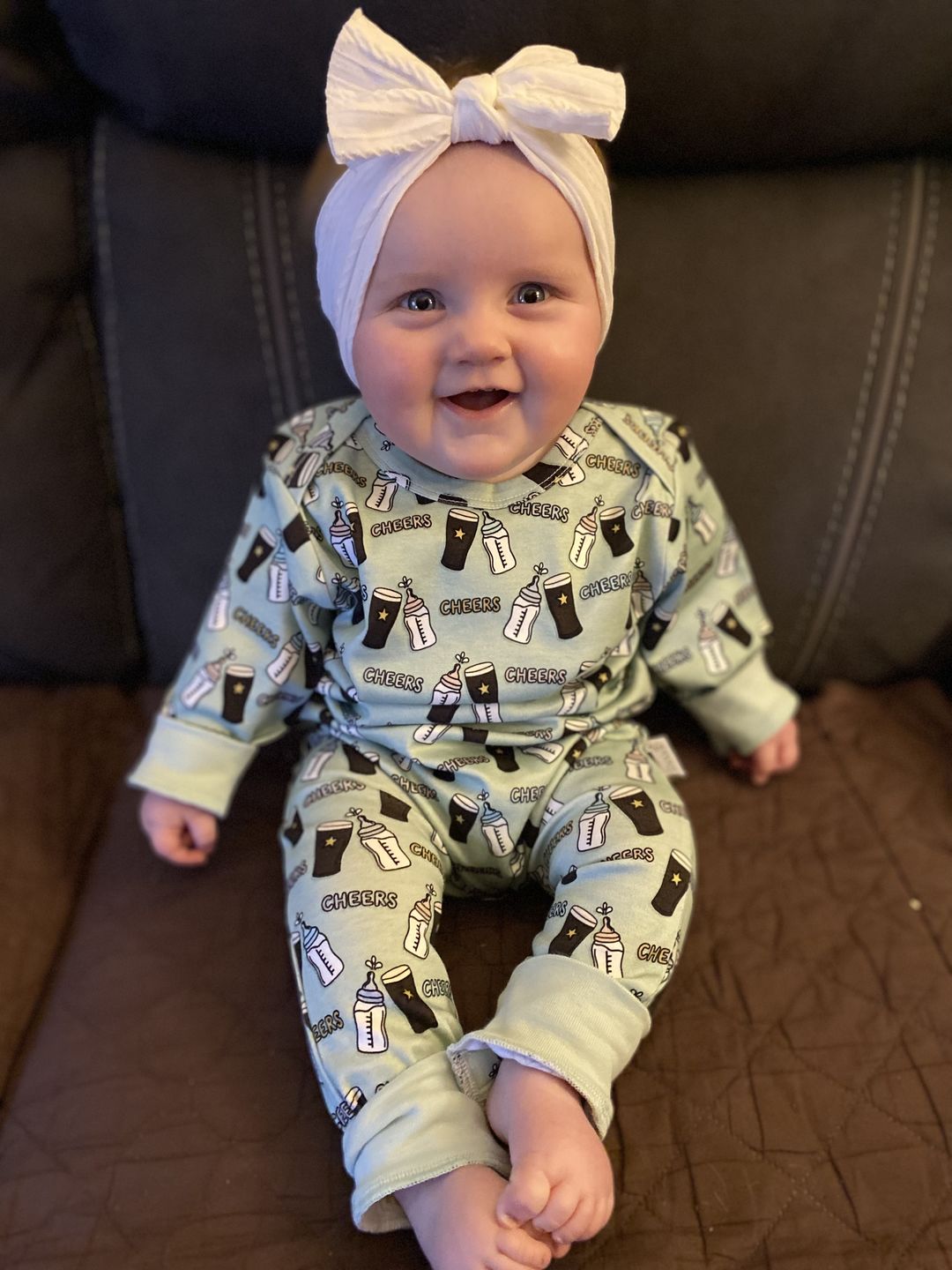 Customer photo review of Cheers Onesie