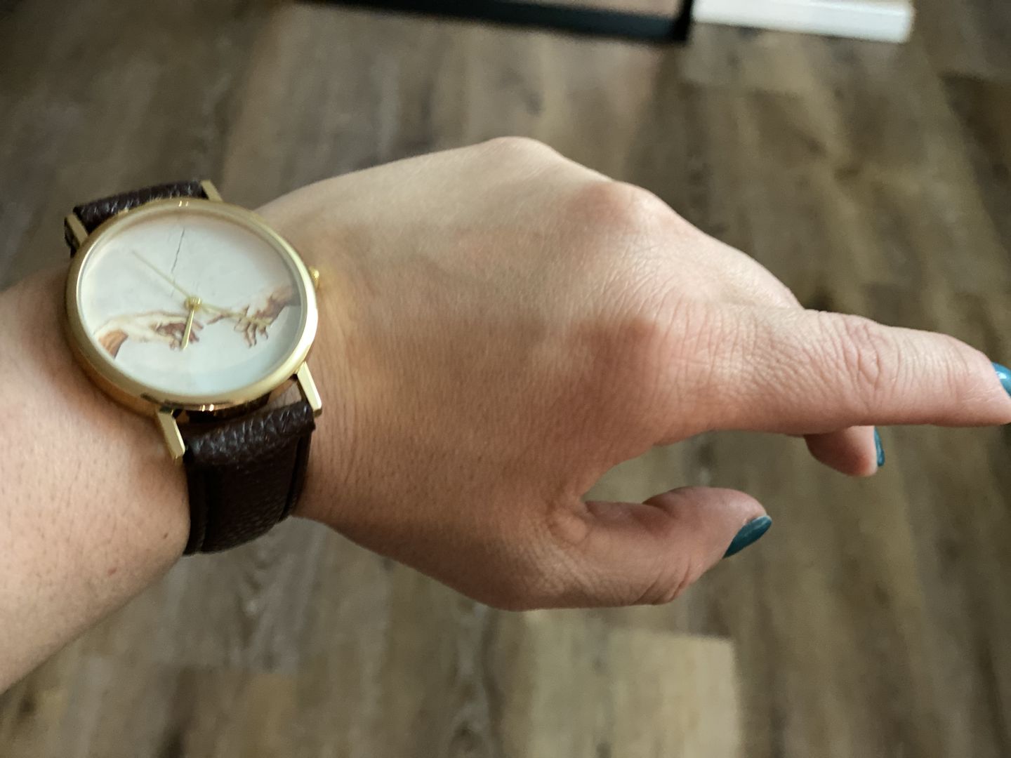 Customer photo review of Creation of Adam Watch