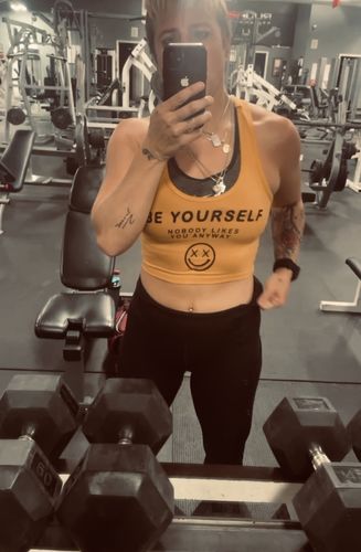 Customer photo review of Salty Savage™ Ladies “BE YOURSELF, NOBODY LIKES YOU ANYWAY” Cropped Racerback Tank | Gold