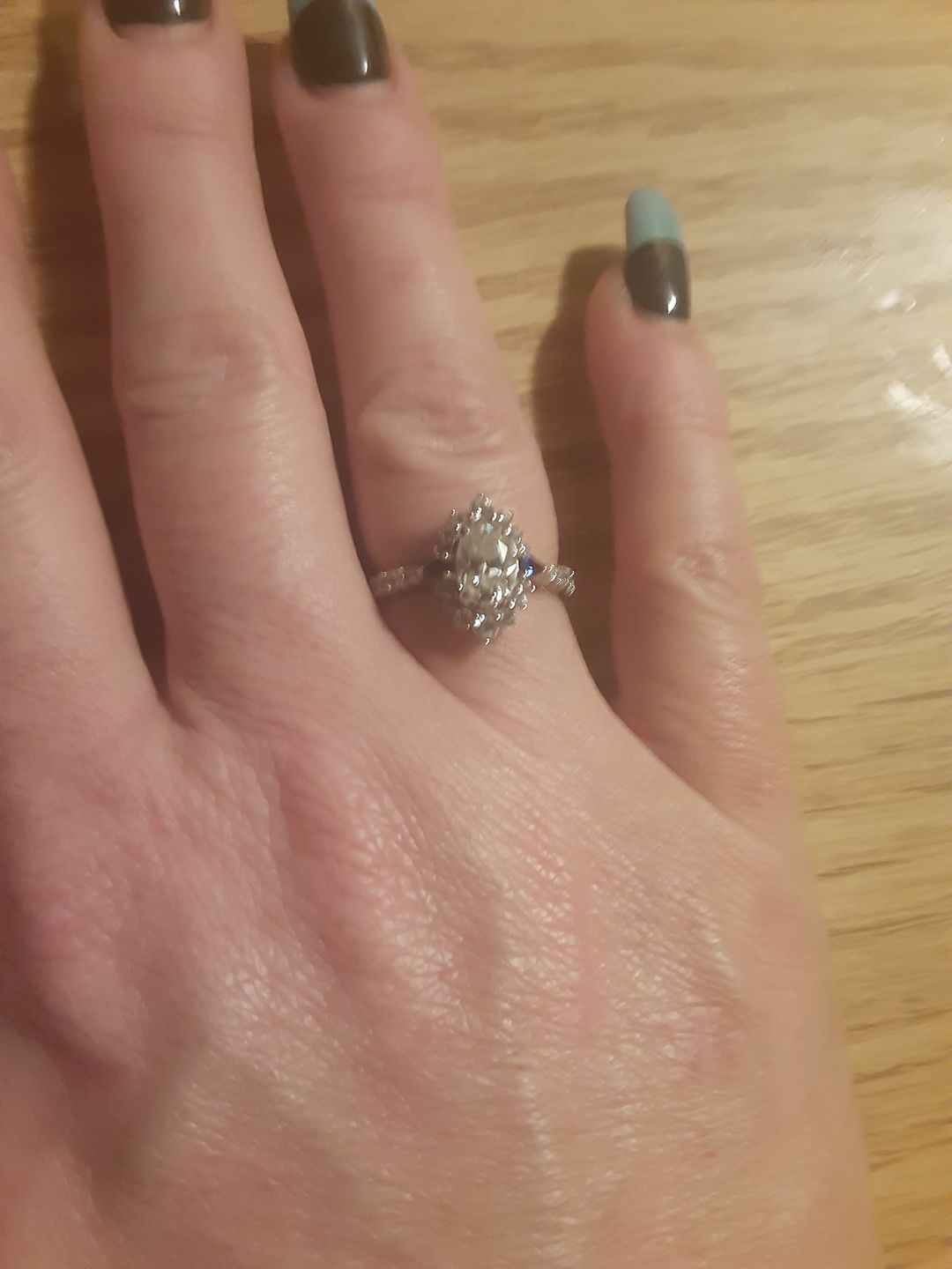 Customer photo review of Halo Oval Moissanite Pear Sapphire Sidestone Pave Engagement Ring