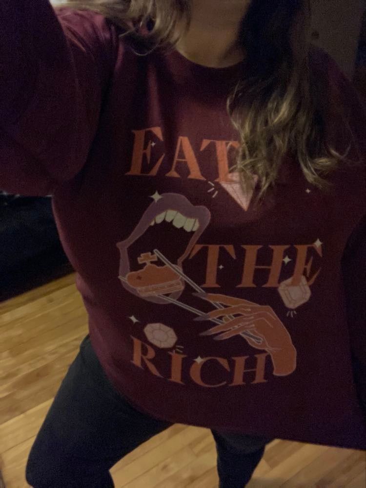 Customer photo review of Eat The Rich Crewneck Sweatshirt