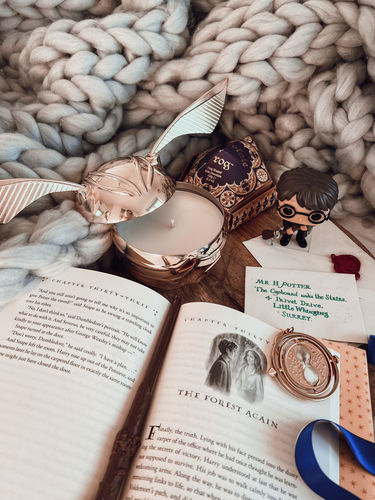 Customer photo review of Harry Potter Golden Snitch Candle - 925 Sterling Silver Golden Snitch Necklace Collection