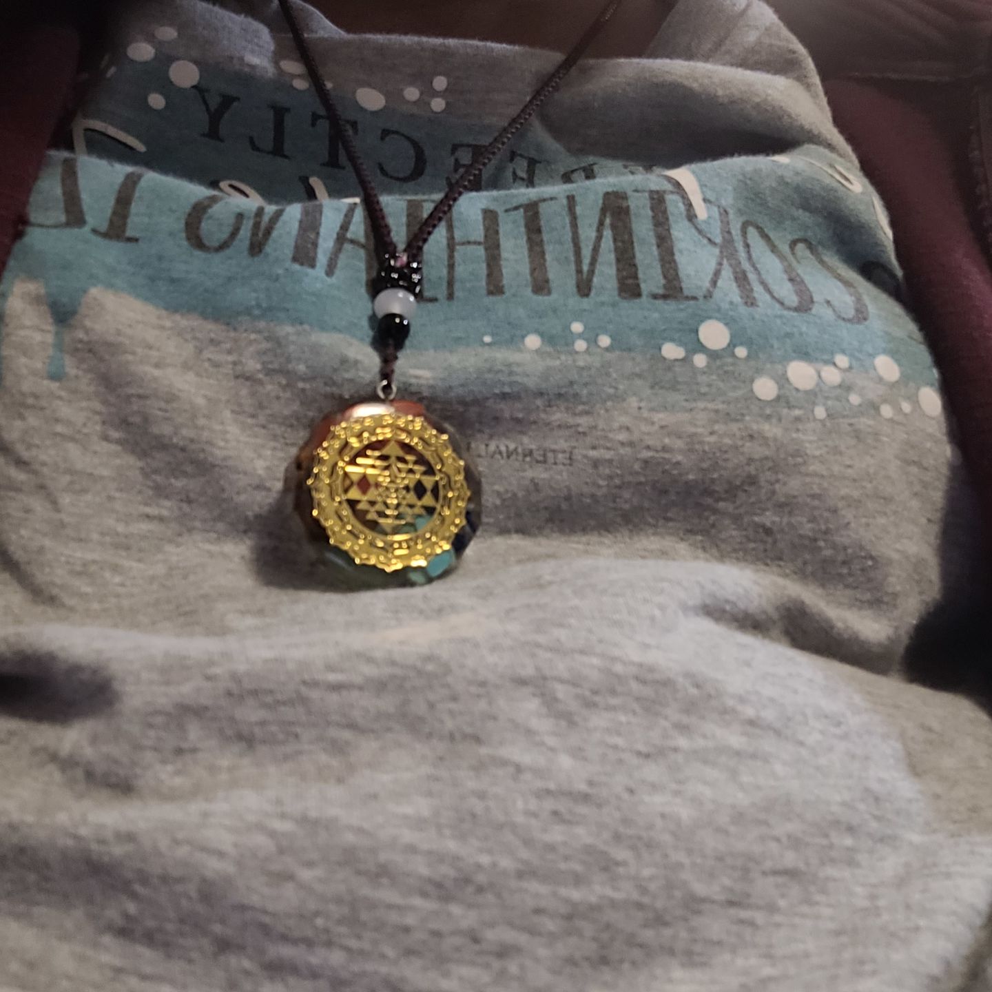 Customer photo review of Sacred Sri Yantra Orgonite Chakra Necklace
