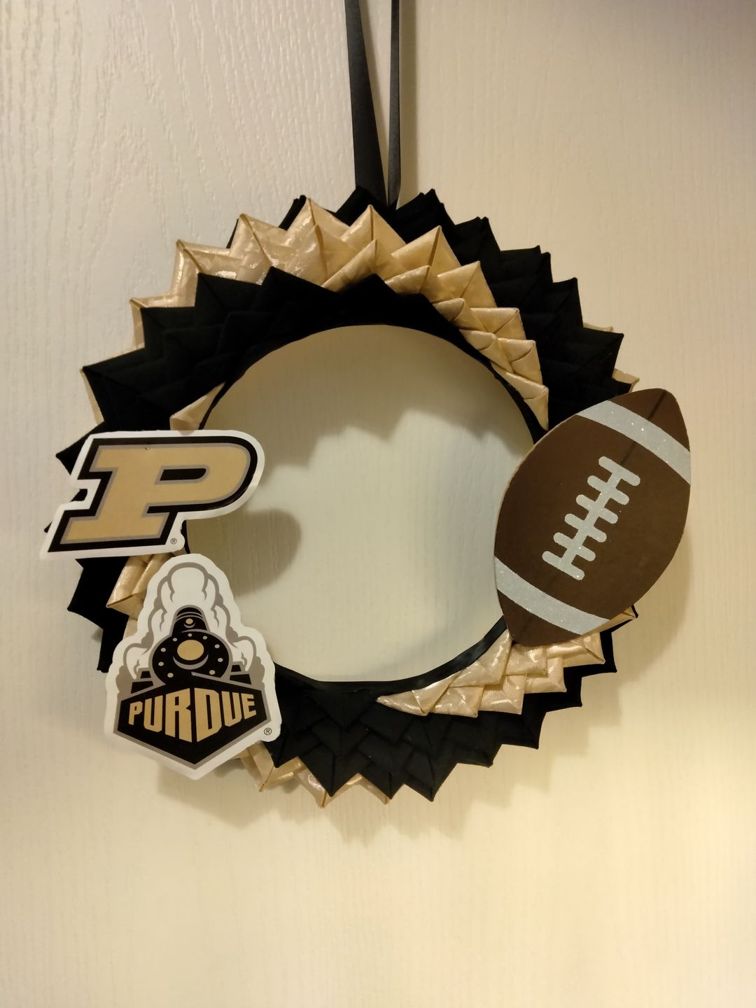 Customer photo review of Unfinished Wooden Football Shape - NFL - Craft - up to 24"