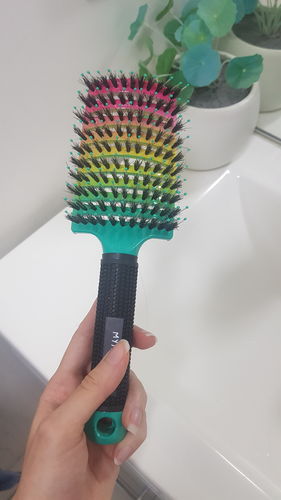 Customer photo review of My Sensory Space Detangler Hairbrush