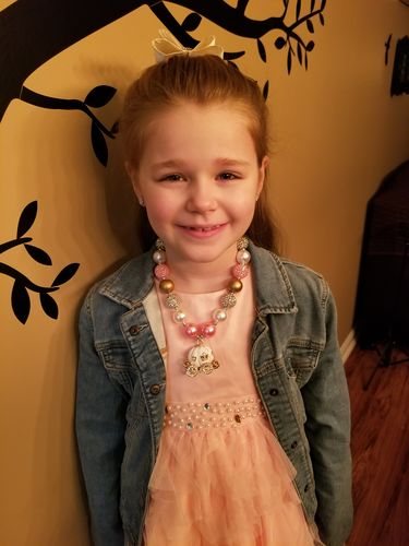 Customer photo review of Pink and Gold Disney Inspired Carriage Necklace