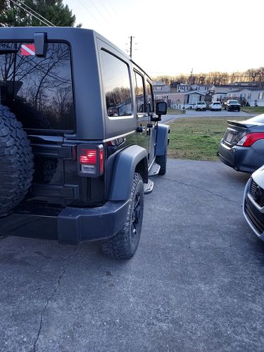 Customer photo review of Textured Black US Flag Tail Light Guards for 07-18 Jeep Wrangler JK/ JKU