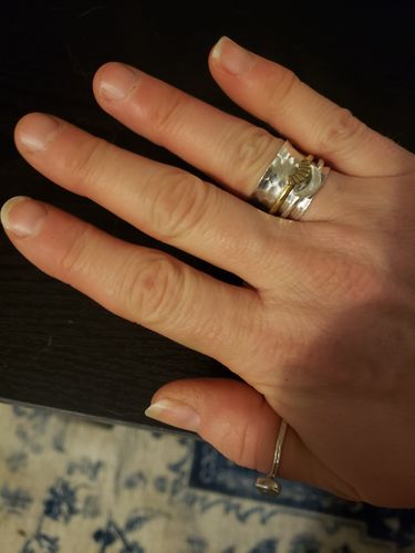 Customer photo review of Sun and Moon Spinner Ring