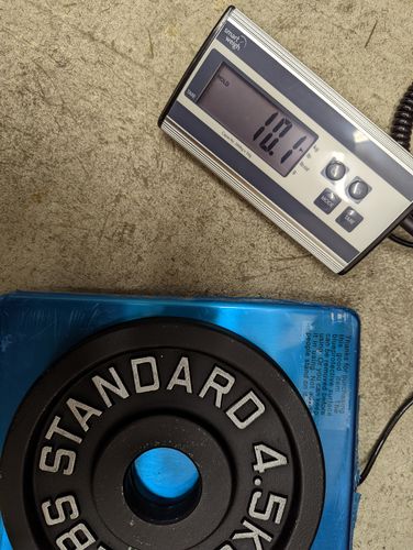 Customer photo review of Cast Iron Olympic Weight Plates