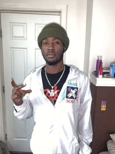 Customer photo review of "Money Bag" Iced Out White Gold Pendant