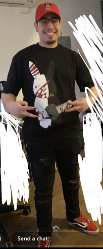 Customer photo review of Chainsaw Plush Tee