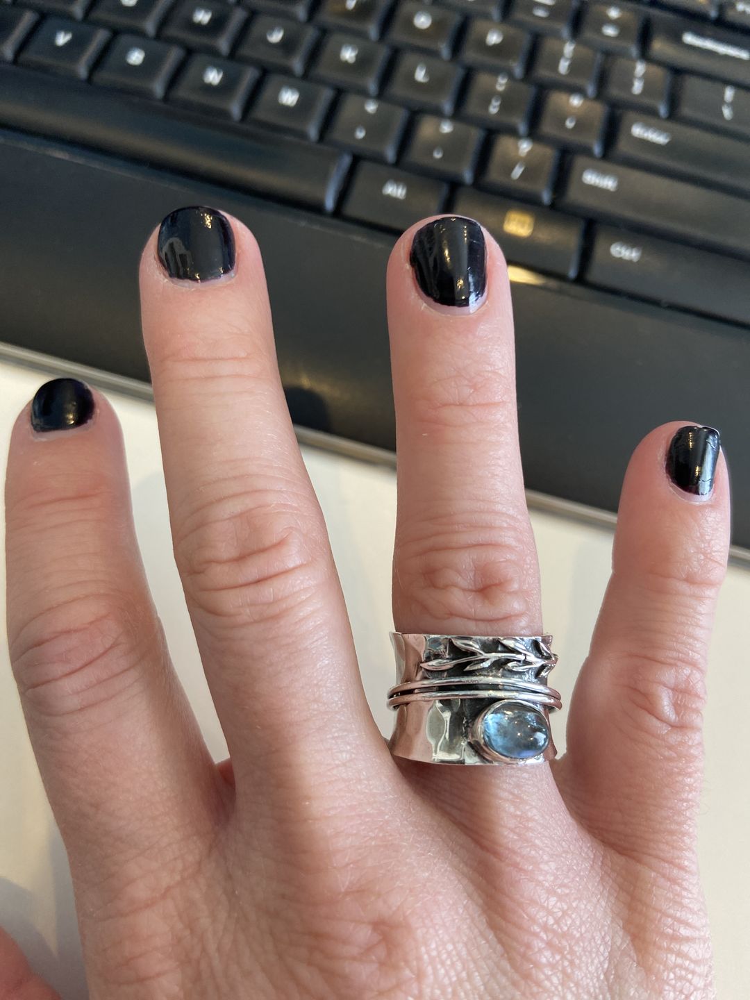 Customer photo review of Aquamarine Leaf Spinner ring Sterling Silver