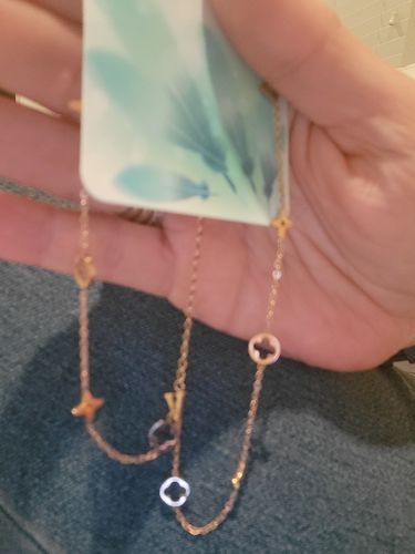 Customer photo review of Rose Gold Floral Dangle Earrings