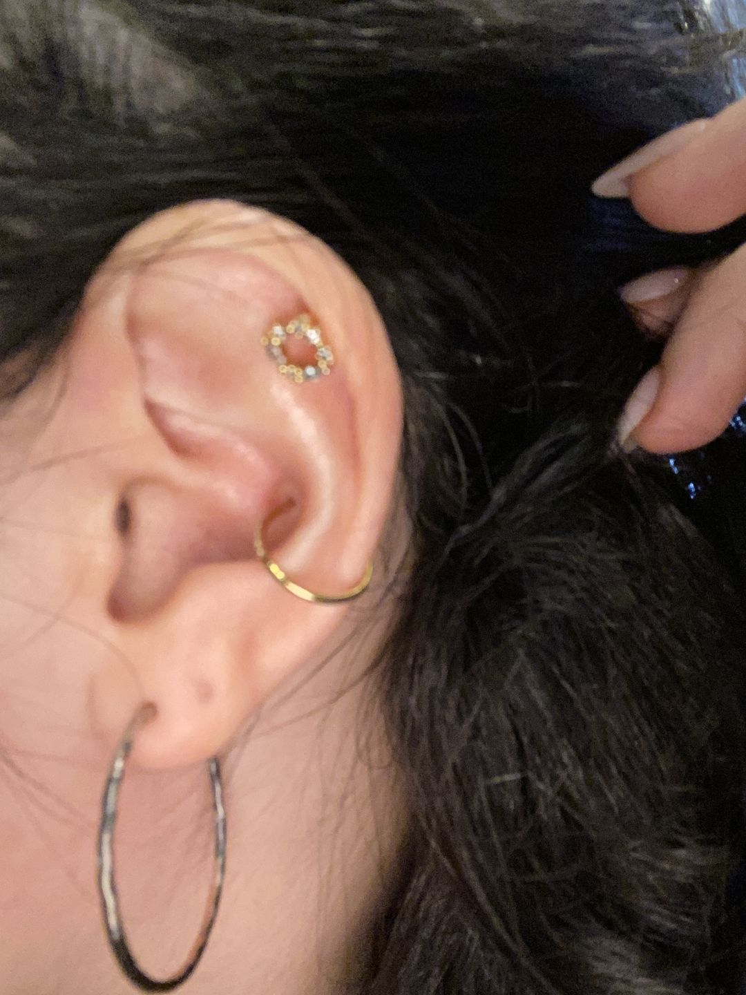 Customer photo review of Conch Clicker | Titan Piercing