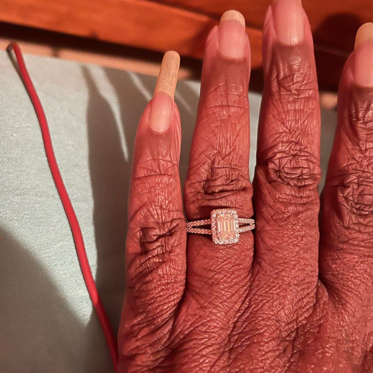 Customer photo review of Halo Emerald Cut Moissanite Split Shank Pave Sterling Silver Engagement Ring