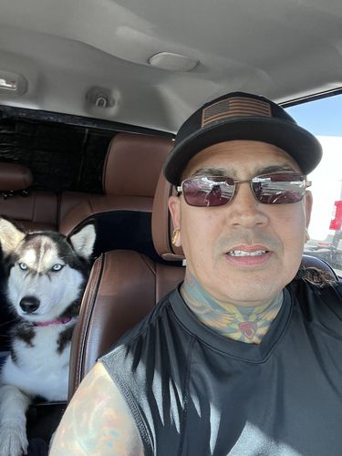 Customer photo review of USA Flag Leather Patch Trucker Hat