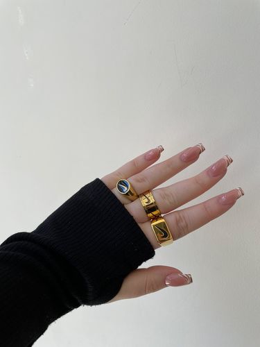 Customer photo review of Lot (Bague Swoosh)