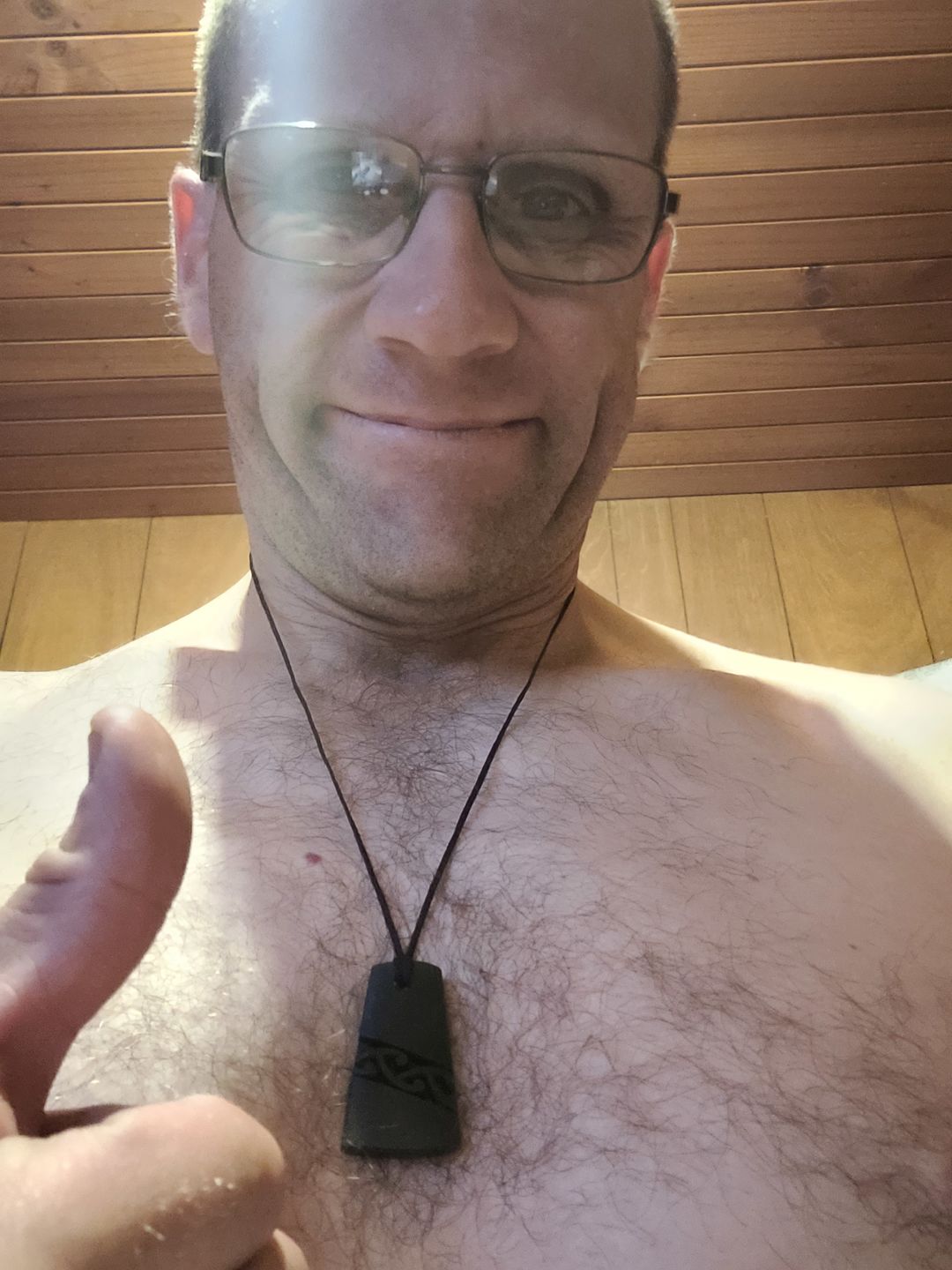 Customer photo review of Genuine NZ Greenstone Toki Necklace with Kowhaiwhai Carving