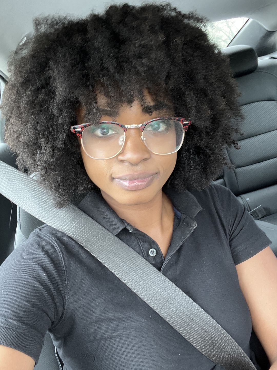 Customer photo review of Amber Bangs Brazilian Kinky Curly 5x5 Lace Closure Bob Wig