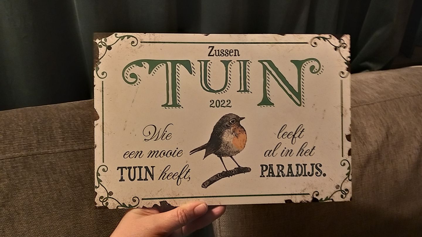 Customer photo review of Tuingeluk - Tuin-deurbord