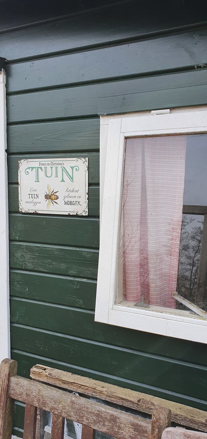 Customer photo review of Tuingeluk - Tuin-deurbord