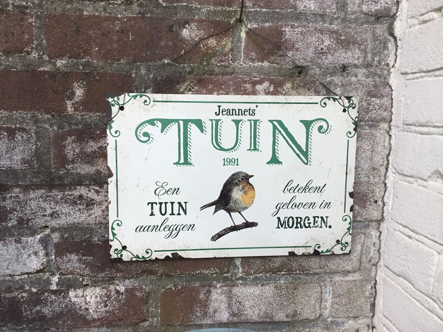 Customer photo review of Tuingeluk - Tuin-deurbord