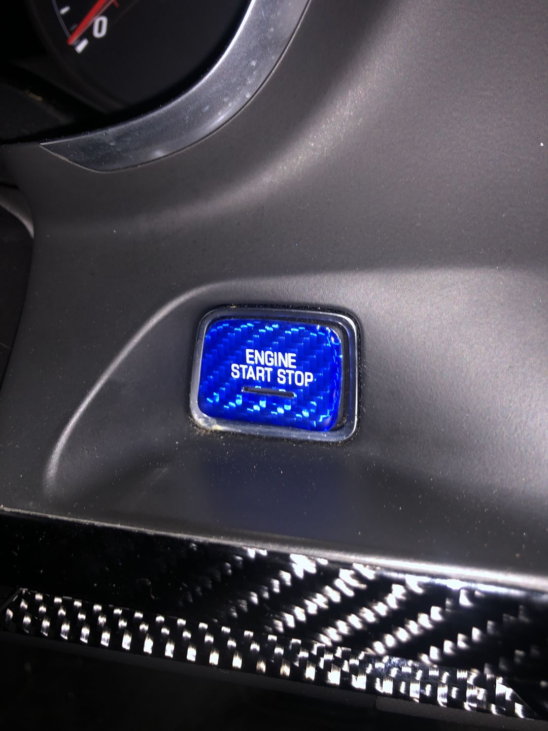 Customer photo review of CARBON FIBER PUSH START BUTTON COVER WITH LIGHT CUT OUT (BLACK/RED/BLUE) for 2016-202- CAMARO/2014-2016 C7 CORVETTE