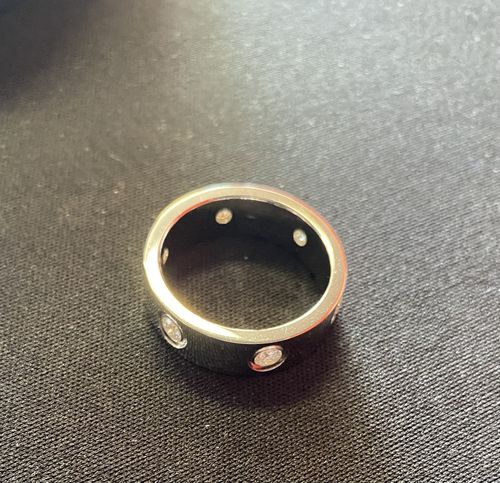 Customer photo review of 0.60 CTW Certified VVS1 Moissanite Designer Ring