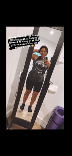 Customer photo review of Salty Savage™ Ladies OG Smile High Neck Sleeveless Acid Washed Tank | Palm Tree Edition | Vintage Black