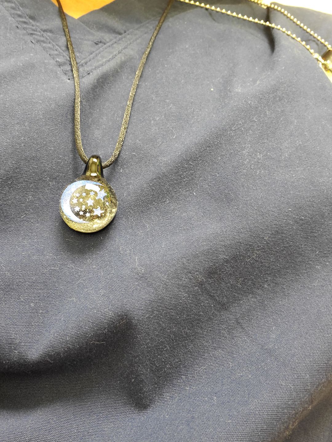 Customer photo review of Moon and Stars Hologram Pendant with Infused Cremation Ash