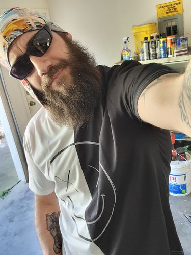 Customer photo review of Salty Savage™ Unisex OG Smile Spliced Smile Two Tone Tee | Black/White