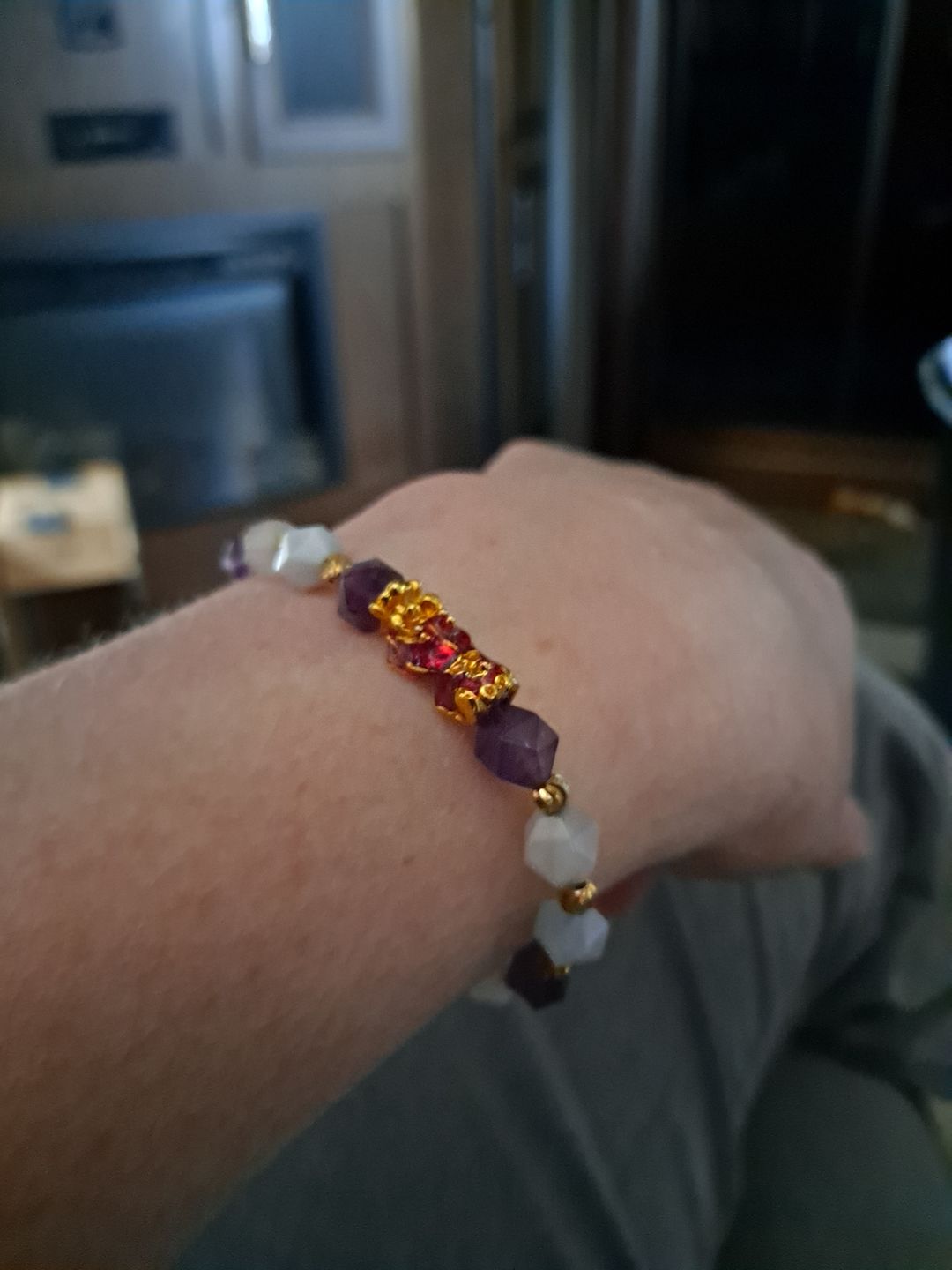 Customer photo review of Wealth Pixiu Charm in Natural Amethyst Bracelet
