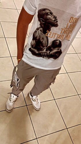 Customer photo review of God Will Fight My Battles Graphic Tee