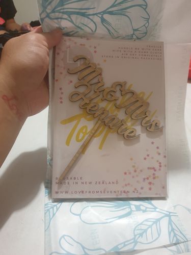 Customer photo review of Personalised Wedding Cake Topper (two colours available)