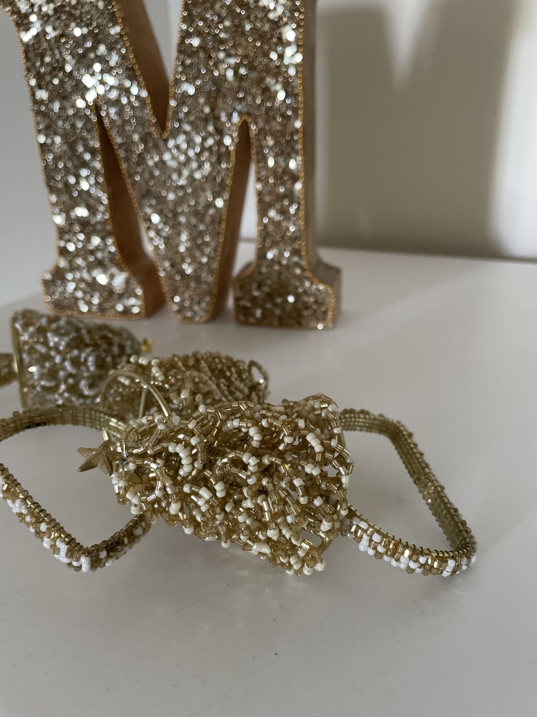 Customer photo review of Yule Tree Napkin RingColor: Gold & CreamSize: 4"x2.5"Set of 4