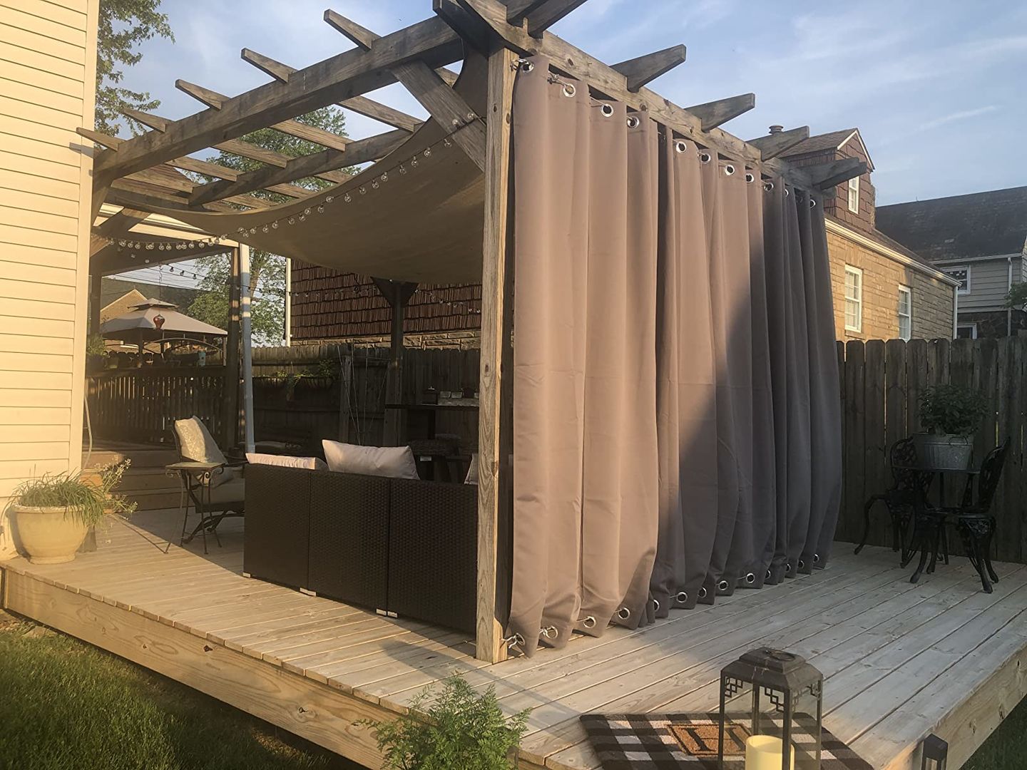 Customer photo review of Top & Bottom Grommet Windproof Outdoor Curtains for Patio 1 Panel