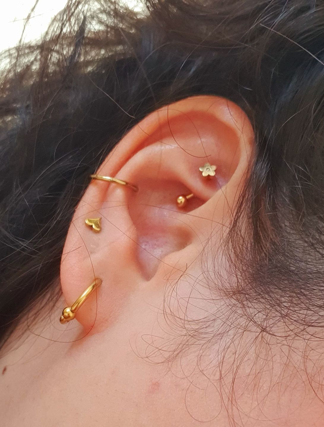 Customer photo review of Cute Flower Rook Piercing | Chirurgenstahl