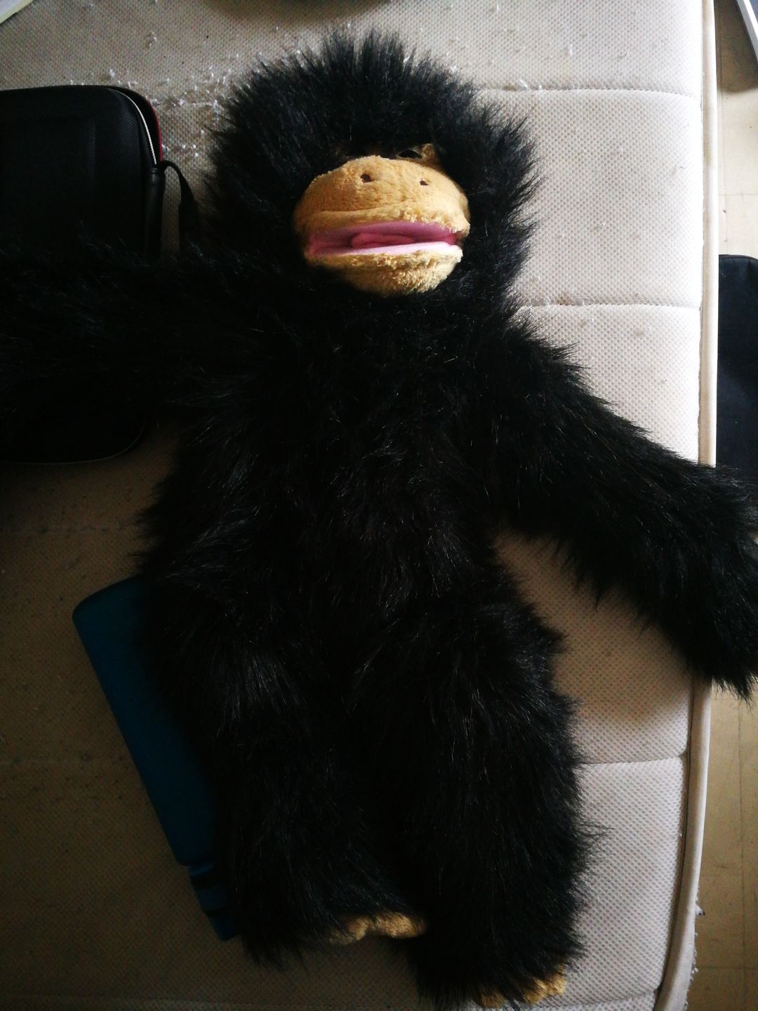 Customer photo review of Singe Marionnette